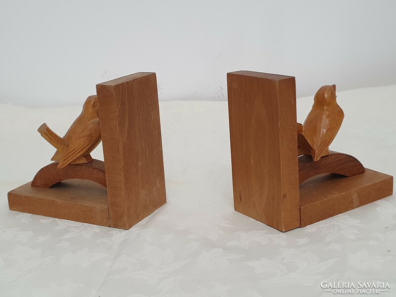 Carved wooden bookend with bird