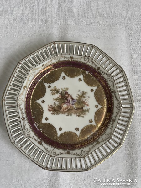 Beautiful antique scene richly gilded decorative plate with openwork edge.