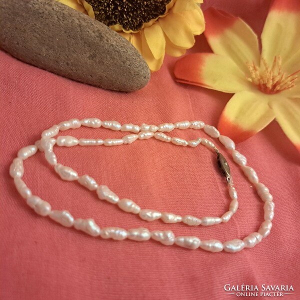 Old cultured pearl necklace.