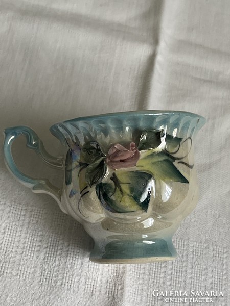 Dreamy antique earthenware teacup decorated with hand-painted plastic flowers