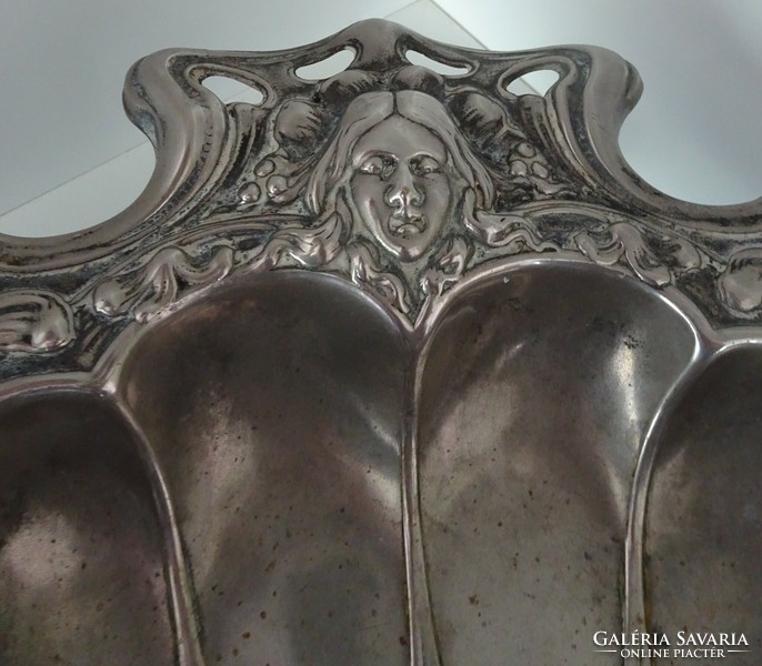 Very nice art nouveau tray decorated with a woman's head.