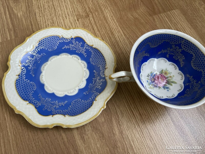 Beautiful collector's porcelain tea cup with saucer.