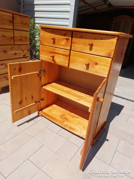 For sale is a tall 4-drawer aniko pine chest of drawers with shelves. Rs furniture furniture in nice, new condition.