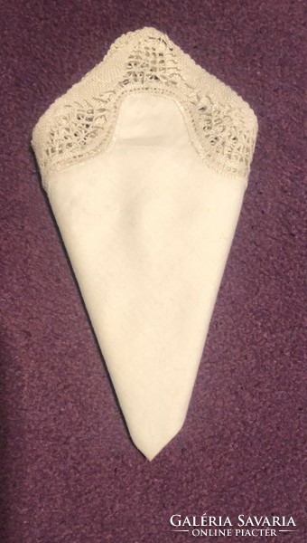 A beautiful, old decorative handkerchief with a lace edge