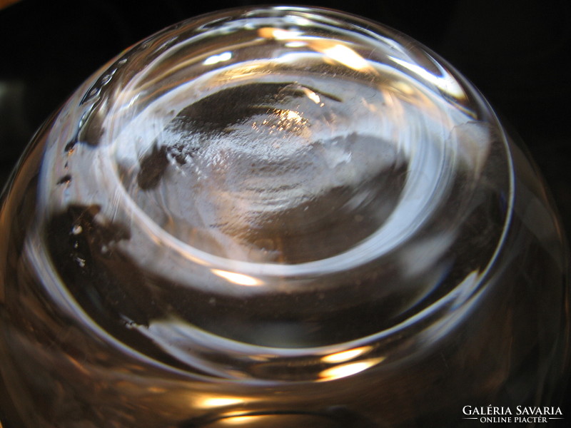 Sphere vase of polished floral glass