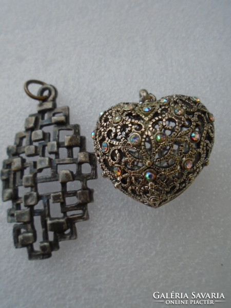 2 old pendants, one is a Swedish craftsman pendant and the other is an openwork heart pendant