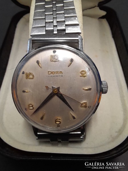 Swiss doxa antimagnetic men's wristwatch.
