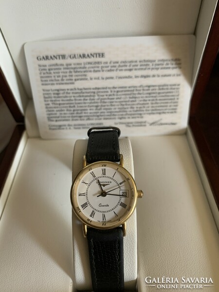 Longines 18 carat gold women's watch. With certificate.