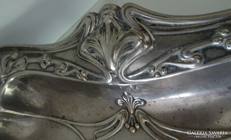 Very nice art nouveau tray decorated with a woman's head.