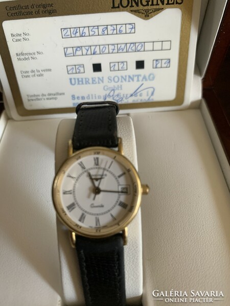 Longines 18 carat gold women's watch. With certificate.