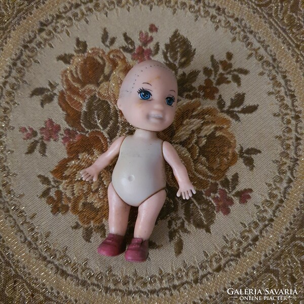 Small old toy doll