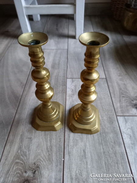 A wonderful pair of antique copper candle holders (24.7 cm)