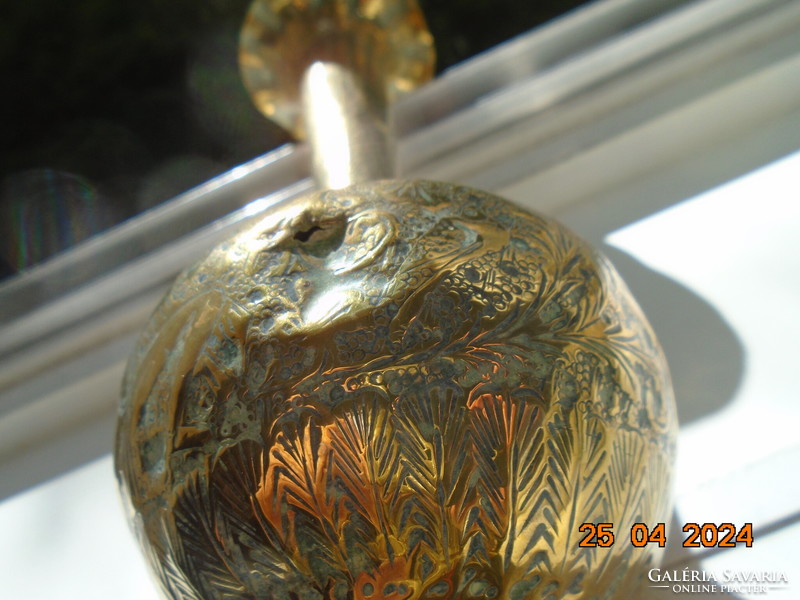 Antique gilded copper treble punched vase with Hindu deity, bird and stylized lush plant patterns