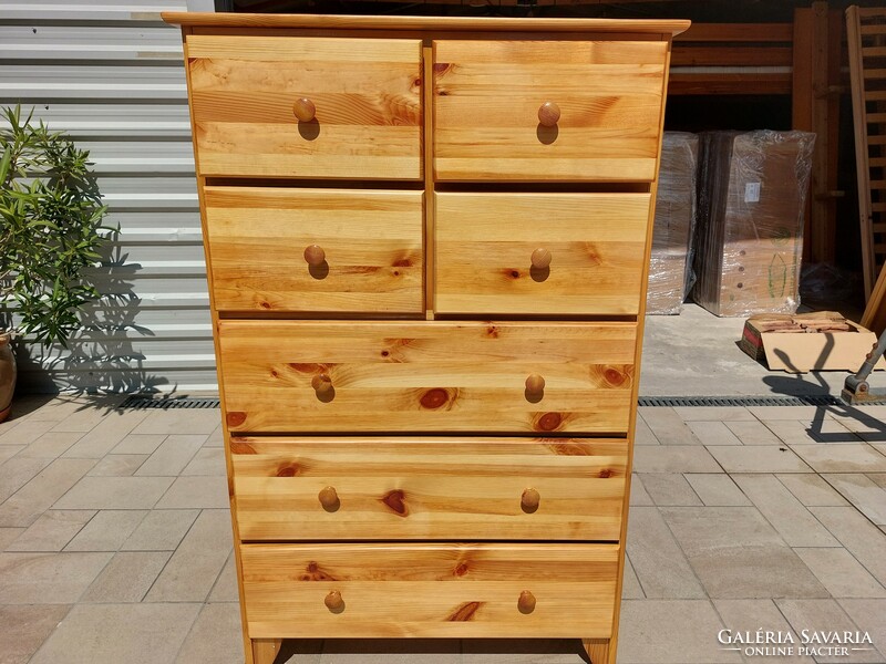 Ikeas pine chest of drawers with 7 drawers for sale.