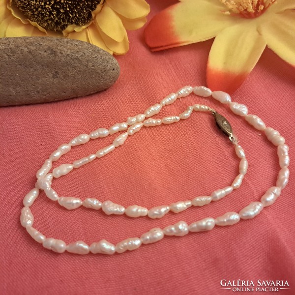 Old cultured pearl necklace.