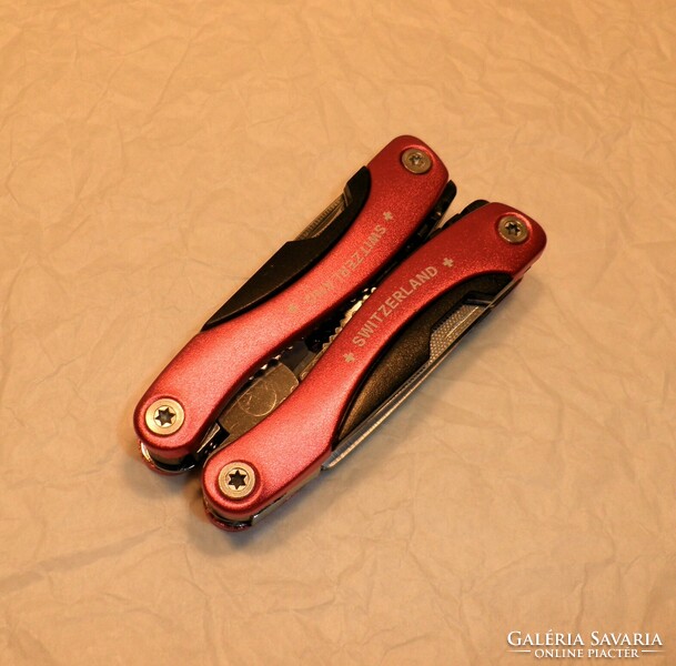 Swiss multifunction pliers, knife. From collection. Uncut!