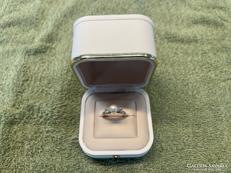 18K white gold ring, with 0.50 Ct diamond, natural pearl, certificate