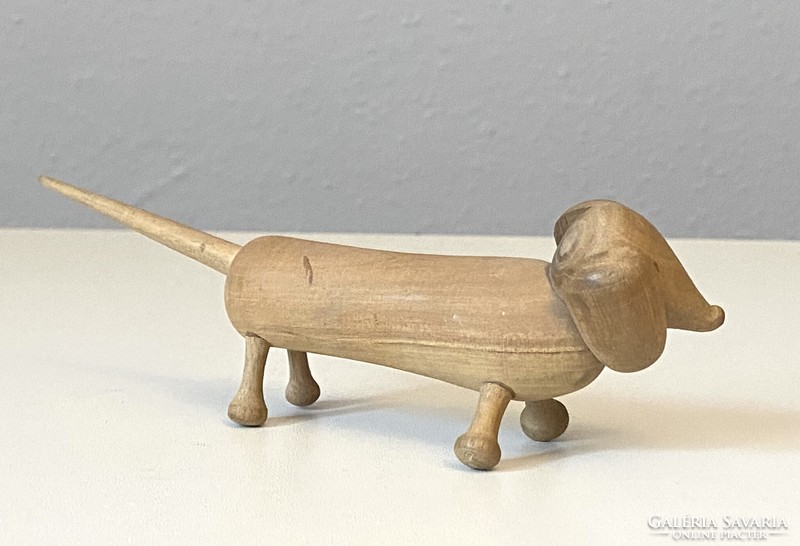 Carved retro dachshund dog carved turned wooden statue