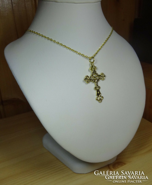 A particularly beautiful necklace with a cross pendant.
