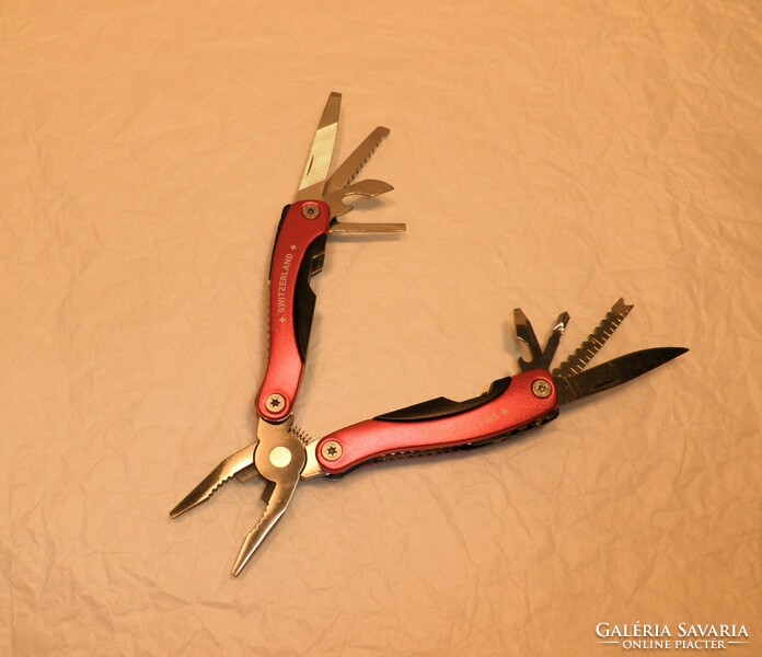 Swiss multifunction pliers, knife. From collection. Uncut!