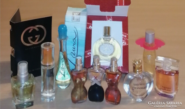 A rare discontinued 10 piece women's vintage mini perfume collection