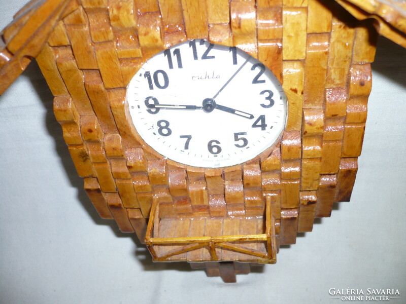 Old wooden wall clock alarm clock with wind-up cloth structure
