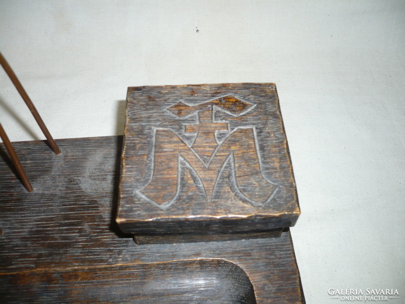 Antique wooden inkstand with worn decoration