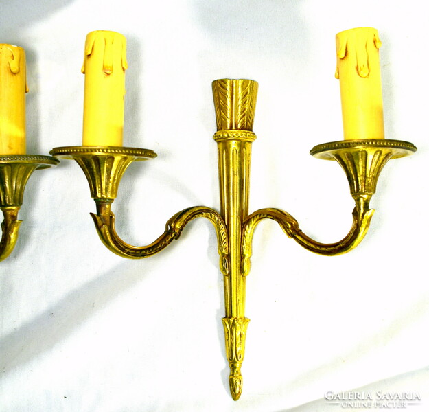 A pair of copper double-armed wall levers in Empire style!