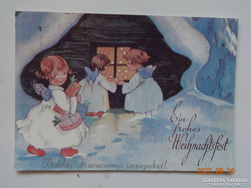 Old graphic Christmas greeting card, angels