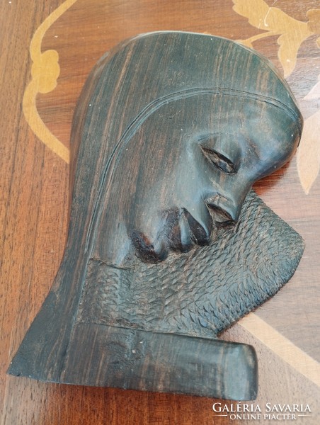 Africa, - female head made of wood