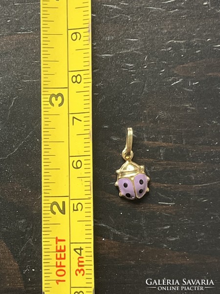 Golden ladybug pendant