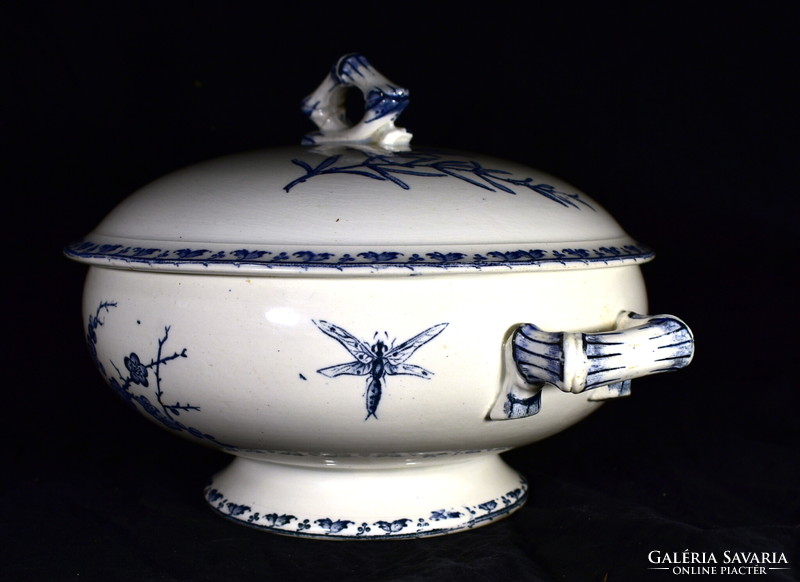 Antique French faience bowl with a floral and insect pattern