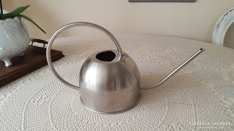 Stainless, shaped watering can