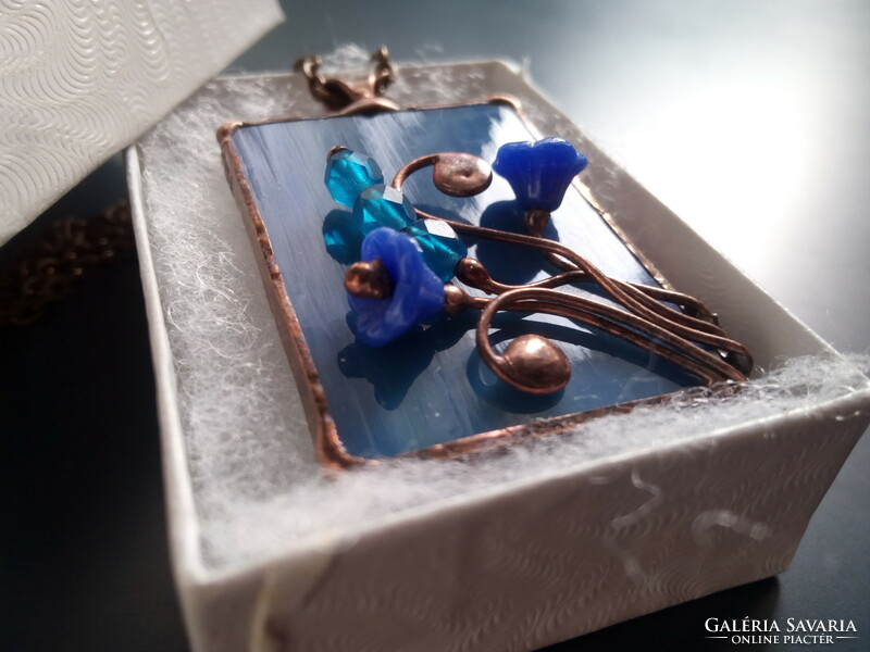 Special handcrafted glass jewelry pendant made of blue glass and pearls