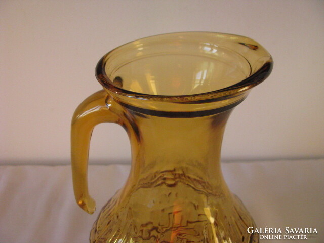 Honey colored glass pitcher