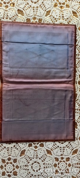 Leather book cover with silk lining