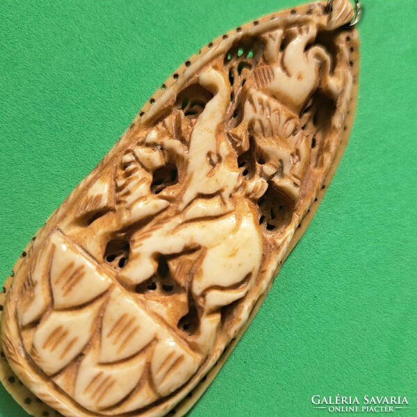 Hand carved bone pendant 7 cm