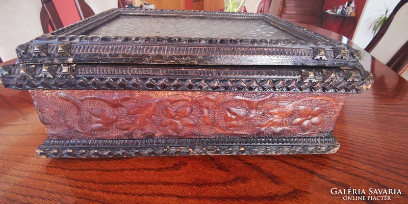 Richly carved wooden chest