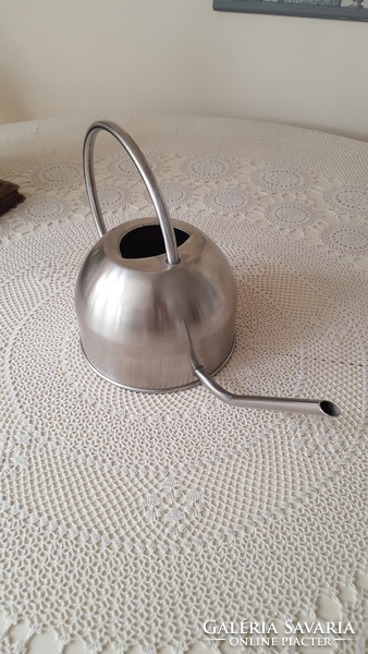 Stainless, shaped watering can