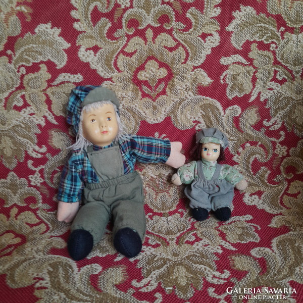 Pair of vintage porcelain head dolls
