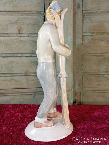 Beautiful skiing girl ceramic figure, sculpture