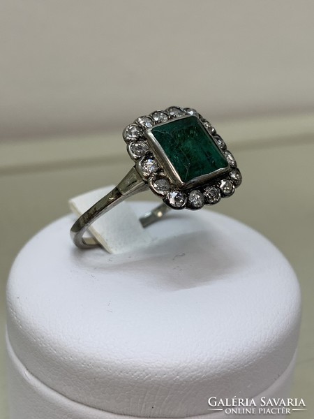 Antique silver ring with emeralds and diamonds