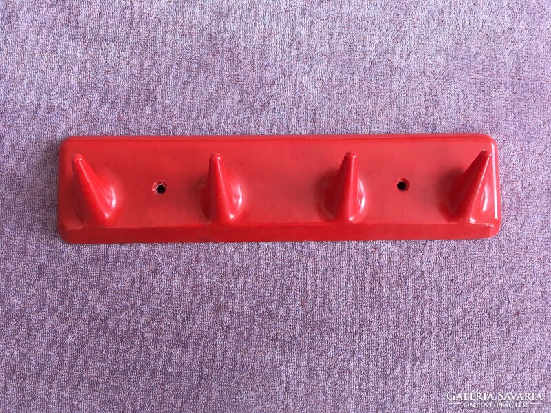 Retro plastic hanger in red color