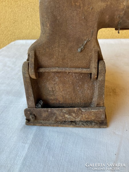 Antique charcoal iron with chimney.