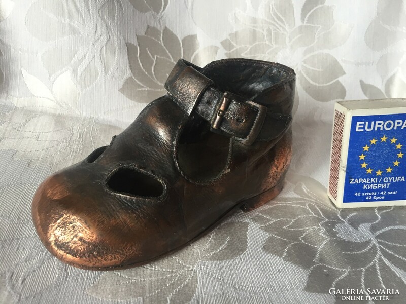 Cute bronzed doll, children's shoes - not an antique piece!