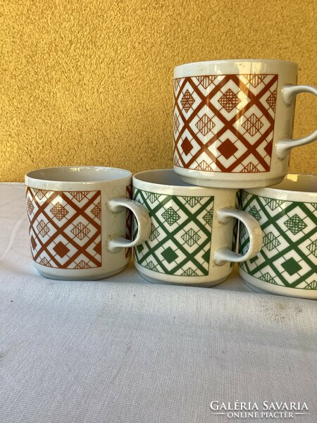 Five lowland porcelain mugs.