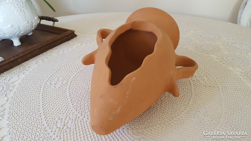 Terracotta reclining amphora flowerpot