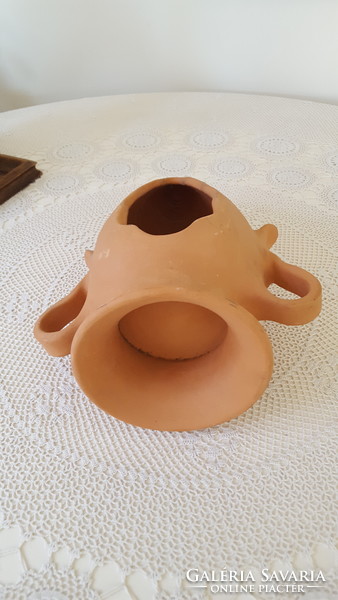 Terracotta reclining amphora flowerpot