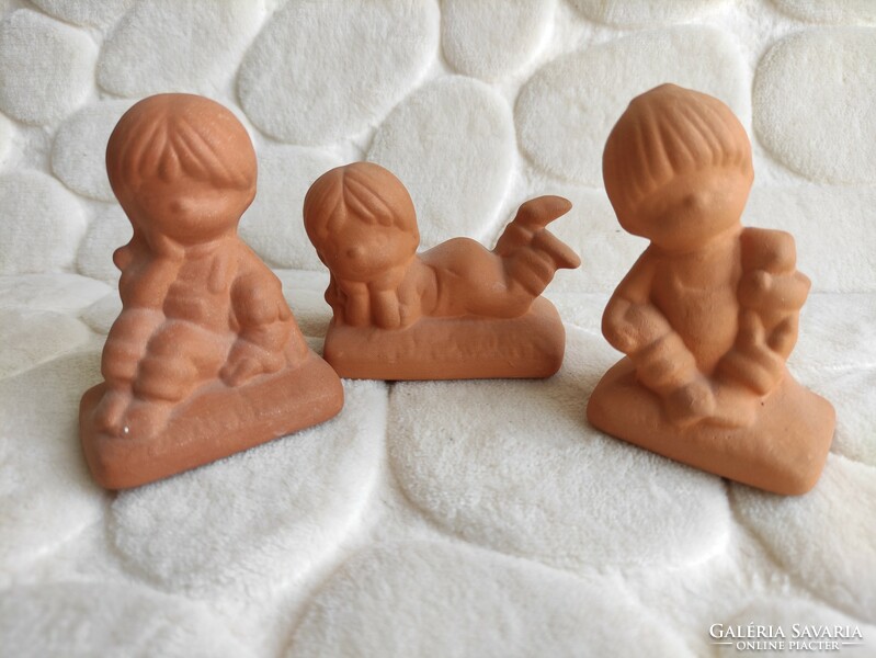 Pack of 3 terracotta-colored ceramic dolls