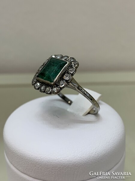 Antique silver ring with emeralds and diamonds